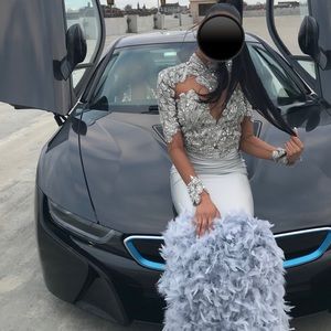 Bedazzled mermaid prom dress with feathers